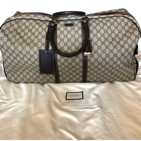 gucci travel bag with wheels|gucci travel bag price.